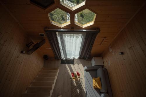 an overhead view of a room with stairs and a window at Beeography guest house in Vardablur