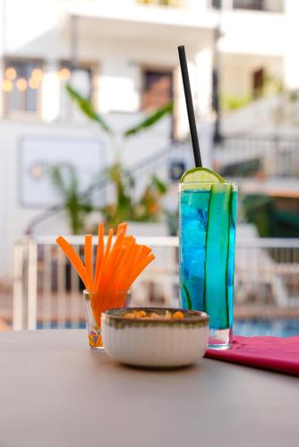 a table with a bowl of food and a drink at Casa Lume in Bodrum City