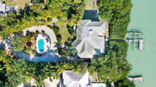 an aerial view of a house with a swimming pool at Royal Palm House in Captiva