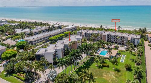 an aerial view of a resort and the beach at Compass Point 221 in Sanibel