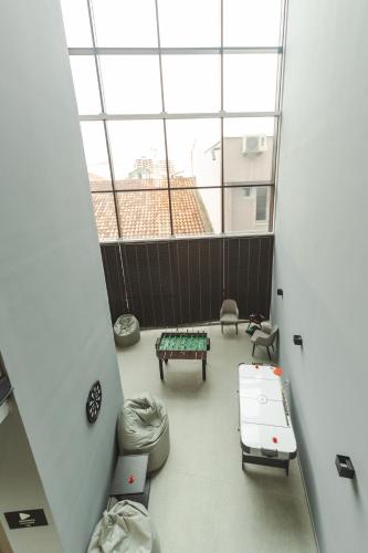 an overhead view of a room with beds and tables at Garni Hotel MB Premium in Budva