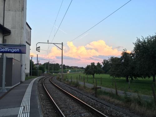 a train track next to a train station at Bed and Breakfast Oase im Seetal in Gelfingen