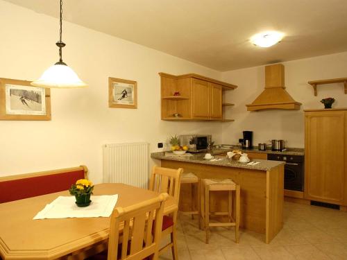 A kitchen or kitchenette at Apartments Mirabell
