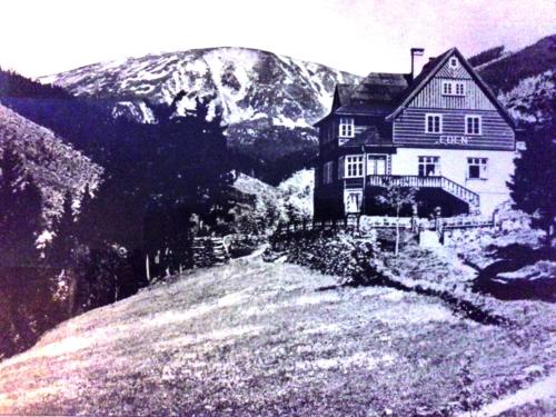 an old photo of a house on top of a hill at Vila Eden in Pec pod Sněžkou