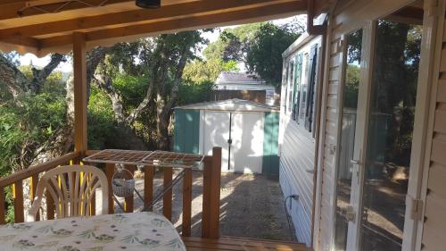 a view from the porch of a house at Mobilhome Rico in Gassin
