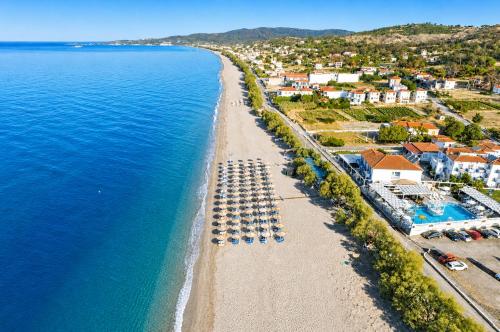 an aerial view of a beach with a resort at Casa Di Nonno-Jacuzzi Mountain View Stay in Lesvos in Agiásos