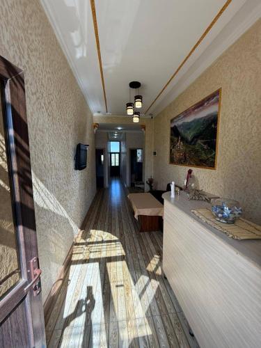 a room with a hallway with a living room at Mirage in Shinuhayr