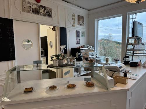 a room with a counter with some food on it at Hotel Carl XII in Ed