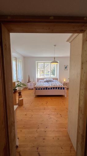 a bedroom with a bed in the middle of a room at Statek Bavorov in Bavorov
