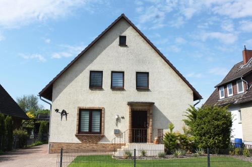 a house with a horse on the side of it at Ferienwohnung Fina in Bad Bodenteich
