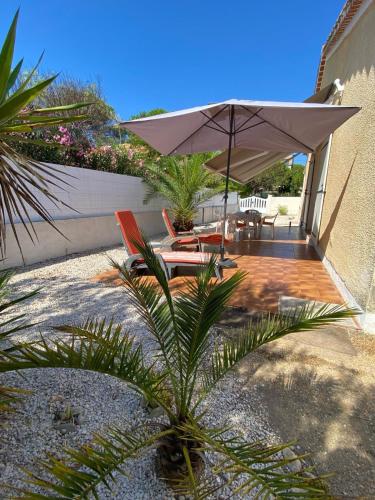 Maison de plage avec jardin clos