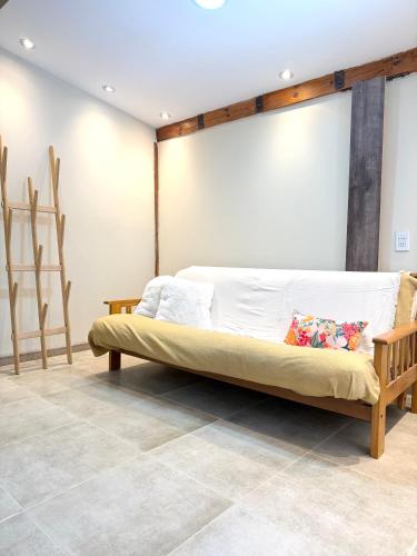 a bedroom with a bed in a room at Deluxe Nueva Casa in General Alvear