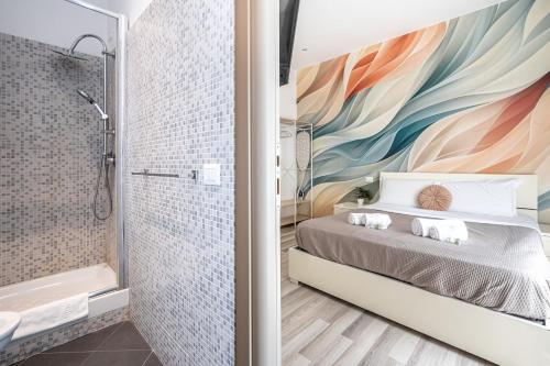 a bathroom with a bed and a shower and a tub at Da Vinci Suite Modern Rooms near Metro Basilica San Paolo in Rome