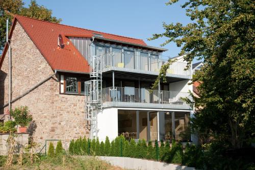 an external view of a house with a balcony at 1463 Apartmenthaus in Karlsruhe