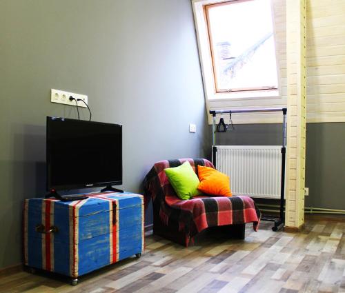 Μια τηλεόραση ή/και κέντρο ψυχαγωγίας στο Lviv Loft Apartments