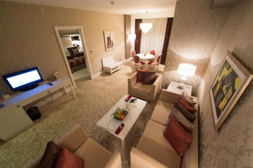 an overhead view of a living room in a hotel room at Qafqaz Baku City Hotel & Residences in Baku