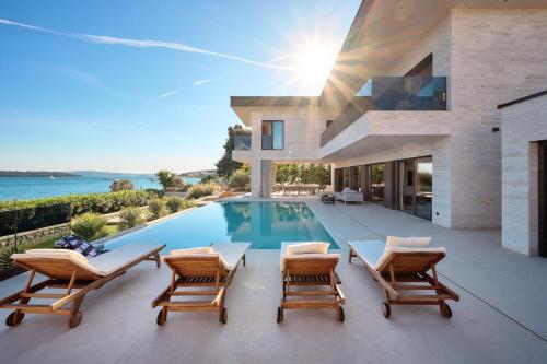Beachfront Villa Malia near Trogir with Heated Pool & Jacuzzi