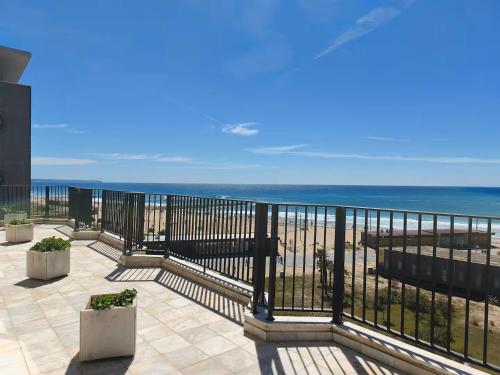 Apartamento acolhedor frente mar com piscina