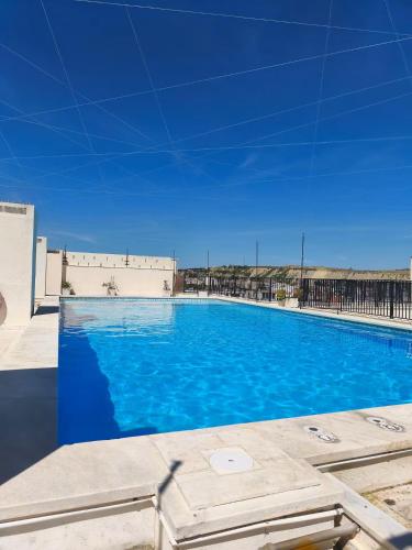 Apartamento acolhedor frente mar com piscina