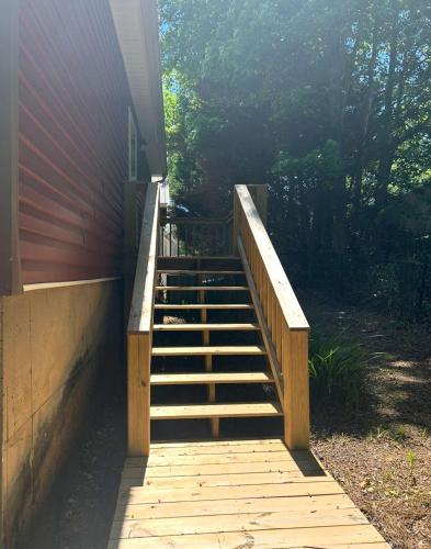 a wooden staircase leading up to a house at High Cotton in Leesburg
