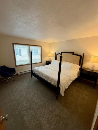 a bedroom with a large bed and a window at Wildcat 4020 in Marion
