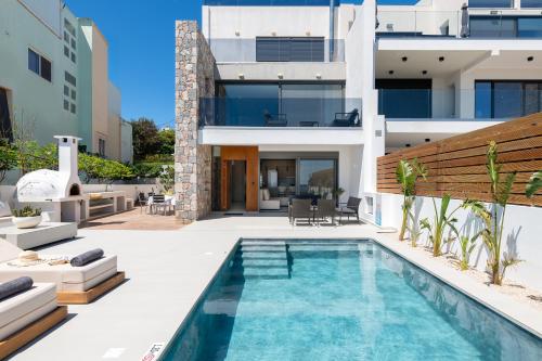 an image of a house with a swimming pool at Ortus Luxury Residence in Rhodes Town