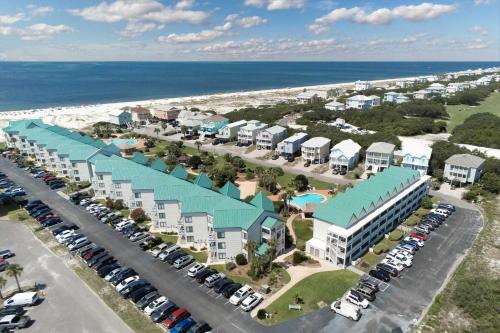 an aerial view of a resort with a parking lot at Plantation West #1365 in Fort Morgan