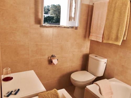 Kylpyhuone majoituspaikassa Porto Monte