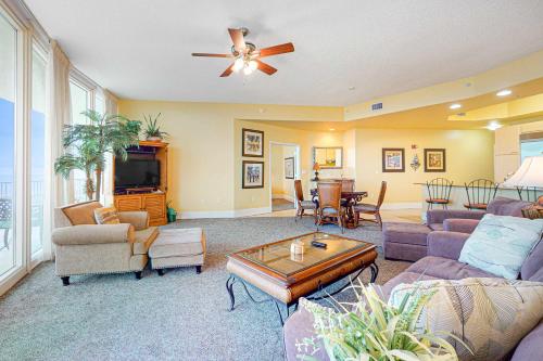 a living room with a couch and a table at Caribe PHB12 in Orange Beach
