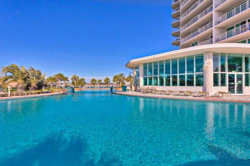 a large swimming pool in front of a building at Caribe PHB12 in Orange Beach