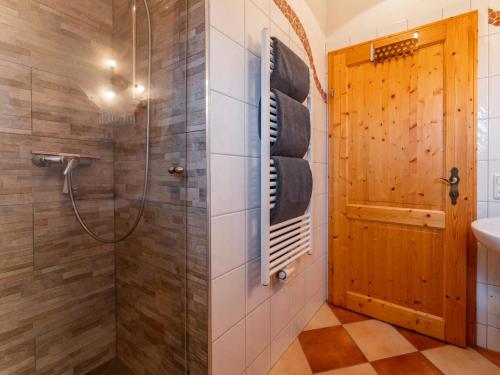 a bathroom with a shower and a sink at Lisa in Piesendorf