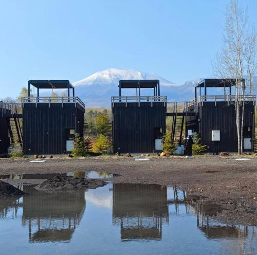a reflection of a mountain in a body of water at Kita Karuizawa Morino Takibi in Tsumagoi