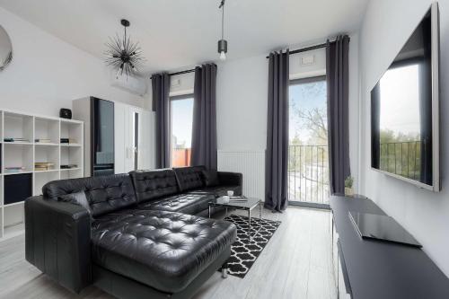 Stylish Apartment Near PGE Narodowy in Warsaw by Noclegi Renters