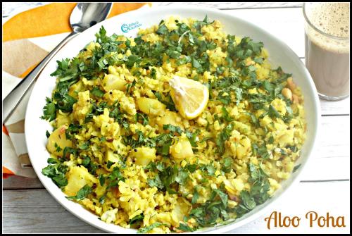 a plate of rice and vegetables with a lemon on it at ''Go Desert'' Homestay in Bhuj
