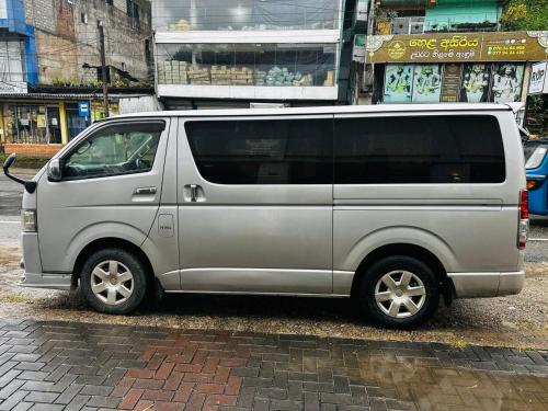 a silver van parked on the side of a street at Kdh TRH 2014 in Wennappuwa