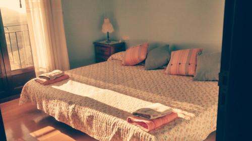 Ένα ή περισσότερα κρεβάτια σε δωμάτιο στο Txantxikonea Etxea