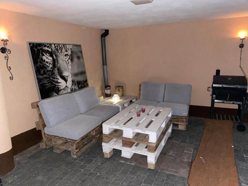 a living room with two couches and a coffee table at Apartament Ostrzyce in Ostrzyce