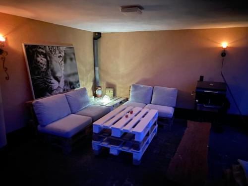 a living room with two couches and a coffee table at Apartament Ostrzyce in Ostrzyce