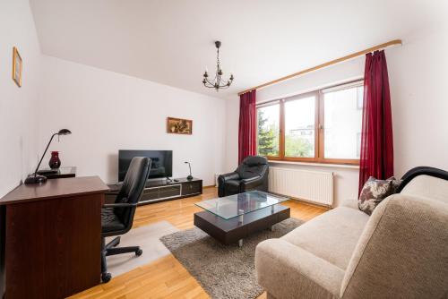 Imielin Homely Apartment by BookingHost