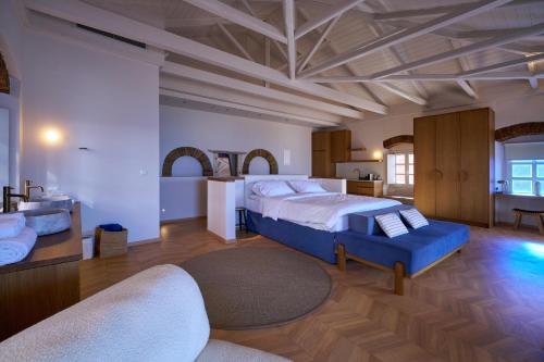 a large bedroom with two beds and a bathroom at Casa Zacco in Parga