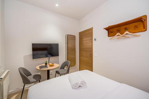 Habitacion privada en alojamiento en Lavapies