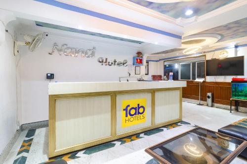 a job horizons office with a loblaws sign on the wall at FabHotel Nand's Residency in Patna