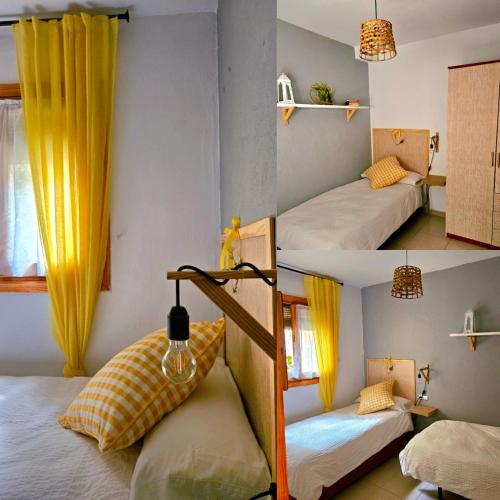 a room with two bunk beds with yellow curtains at CASITA LUAN in Tragacete