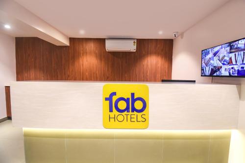 a toro hotels sign on a reception desk at FabHotel Shourya Regency in Jāmb