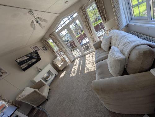 an overhead view of a living room with a couch at J&J Retreat in Morpeth