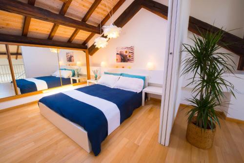 Llit o llits en una habitació de Via Breda 120