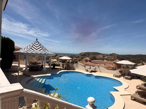 a large swimming pool on top of a building at CASABA - Boutique - Torre del Mar in Torre del Mar
