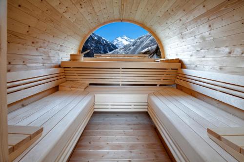 a sauna with a window in the middle at HEART - Manufaktur Appartements in Sölden