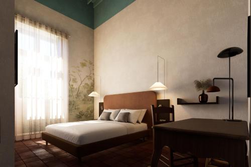 a bedroom with a bed and a desk and a window at BYPILLOW Del Presto in Florence