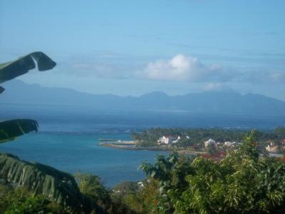 a view of a large body of water from a mountain at Villa Alizea in Capesterre-de-Marie-Galante